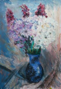 Mixed flowers in blue vase